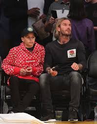 David Beckham Rocks Kurt Curwen Sweatshirt And Adidas Originals Sneakers With Romeo Beckham Wearing Louis Vuitton X Supreme Hoodie Vibzn Com Romeo Beckham Celebrity Kids Fashion David Beckham