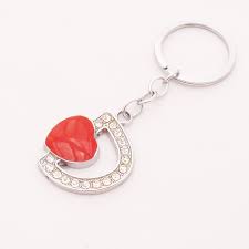 It looks as if the letter d is inside the heart, which might look similar to the wearer's . Free Shipping Chaveiros Chaves Creative Heart Key Ring Alphabet D Fancy Keychain Items Wholesale 2014 Fashion Letter Souvenir Souvenir Doll Ring Spinesouvenir Wedding Aliexpress