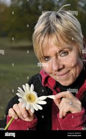 Plucking flower petals hi-res stock photography and images