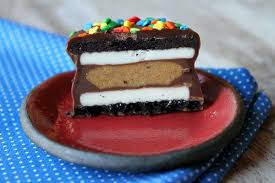 Chocolate Dipped Peanut Butter Cup Stuffed Oreos Recipe Oreo Food Delicious Desserts