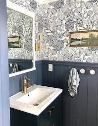 The stenciled black cutting edge nola stencil on crisp white is a huge upgrade from the. Alannah Navy Botanical Wallpaper Floral Bathroom Small Bathroom Wallpaper Powder Room Design