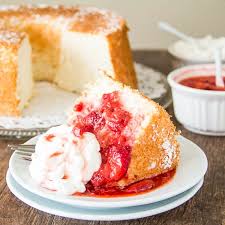 Slowly stir in water until glaze is pourable (you may use more or less than. Angel Food Cake With Strawberry Sauce Sweet Savory