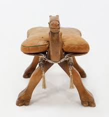 Vtg wood camel saddle stool w/ leather pad egyptian hand made footstool ottoman. Vintage Camel Saddle Stool 1960s At 1stdibs