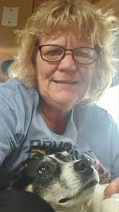 Visitor and dog photo shared