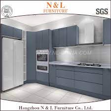 Choose grey furniture pieces, opting for structured shapes that feel more elegant. China White Grey Lacquer Handle Less Design Polyurethane Kitchen Furniture China Kitchen Furniture Kitchen Cabinets