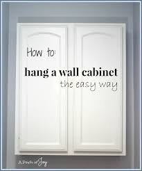 Check out our wall cabinet selection for the very best in unique or custom, handmade pieces from our home & living shops. How To Hang A Wall Cabinet The Easy Way A Pinch Of Joy