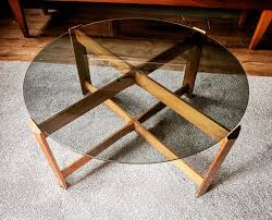 Dark oak/black medium round wood coffee table with tray nathan james is the furniture company built nathan james is the furniture company built for this generation. Nathan Mid Century Teak Coffee Table With Circle Round Smoked Glass Top Nathan Furniture Round Glass Coffee Table Glass Table Living Room Teak Coffee Table