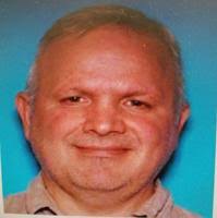 Two people charged in hit and run death of cyclist