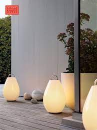 The luau portable lamp (2006) makes standard table lamps look so, well, stationary. Luau Portable Led Lamp Design Within Reach Portable Led Lamp Led Lamp Design Landscape Lighting