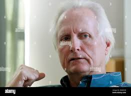In this March 1, 2012 photograph, Jim Walker Jr., sits in his attorney's  Gulfport, Miss., office. The clear cut of a large strip of Walker's  86-year-old mother's property without proper compensation for