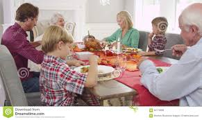 Wishing you the happiness of good friends, the joy of a happy family, and the wonder of the holiday season. Extended Family Sitting Around Table For Thanksgiving Meal Grandmother Makes Short Speech Before They Start To Eat Stock Video Video Of Generation Medium 62772299