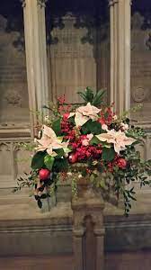 Floral arrangements for pentecost | flowers, for church⛪. Flower Arrangements In A Side Chapel Of Washington National Cathedral Christmas 2014 Flower Arrangements Church Flowers Altar Flowers