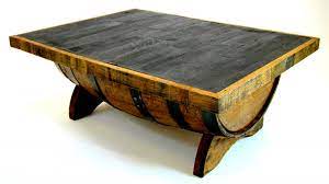 Table top is 1 1/4 thick, 48 or 56 round made from hickory or qswo with center glass insert displaying the jack daniels logo. Jack Daniels Barrel Furniture Hungarian Workshop