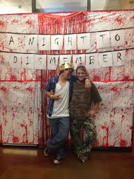 Pin By Andrea Mowers On Zombies Take The Library Halloween House Party Halloween Photo Booth Zombie Party