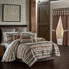 Bed skirts are designed to be placed between a mattress and a box spring or comforter sizes can vary by brand, but some companies do sell comforters larger than a king size. King Rustic White Comforter Sets Ashley Furniture Homestore