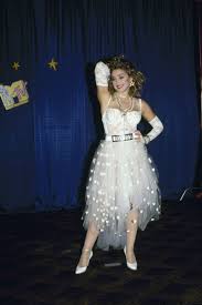 The 50 Most Scandalous Dresses In History Iconic Dresses Madonna Fashion Madonna Costume