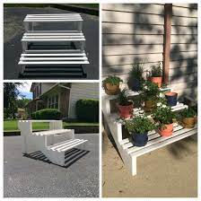 Diy Plant Stand Using Stair Stringers For The Sides Garden Stairs Plant Shelves Outdoor Diy Plant Stand