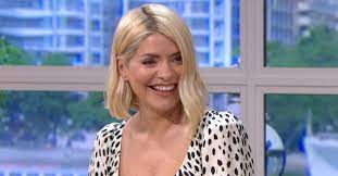 Holly willoughby's orange floral dress is from this high street brand. Holly Willoughby Dress Today Host Stuns In Racy Dress With Thigh High Slit