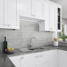 The light shade of grey reinforces the white, natural stone that is used as the kitchen countertop. Daltile Restore 4 In X 16 In Glazed Ceramic Ash Gray Subway Tile 13 2 Sq Ft Case X1144161p2 The Home Depot In 2021 Grey Subway Tile Kitchen White Kitchen Backsplash Kitchen Renovation