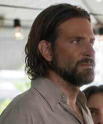 Bradley cooper's envious hair and beard styles are just cool! The Meaning Behind Bradley Cooper Lady Gaga S Hair In A Star Is Born Lady Gaga Hair Bradley Cooper Hair Long Hair Styles Men