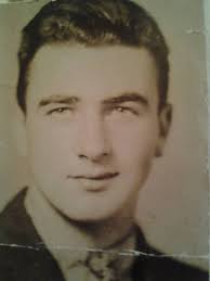 This photo was taken in August 1905 and shows my grandfather as an 18 year  old coachman. The man