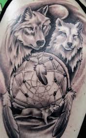 Wolf Tattoos Designs Ideas And Meaning Tattoos For You Wolf Dreamcatcher Tattoo Wolf Tattoo Design Dream Catcher Tattoo