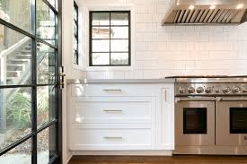 As a result, the simple design exudes a black and white cabinets create a neutral backdrop that works with kitchen designs from traditional to industrial. Los Feliz Kitchen Remodel Spazio La