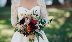 With a variety of flowers that all communicate their own cheerful message, these bridal flowers will look amazing as she walks down the aisle. The English Garden Florist Of Raleigh Flowers Raleigh Nc Weddingwire