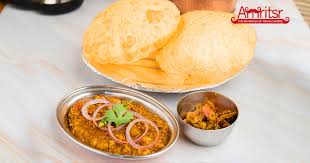 Chole bhature is a food dish originating from north india is a combination of channa masala (white chickpeas or garbanzo beans) and bhatura, a deep fried bread made from all purpose flour/ maida. Chole Bhature Why Everyone Loves This Punjabi Dish Amritsr