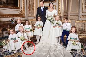 Peter was accused of cashing in on his family connections by selling wedding photos to hello magazine for a reputed £500,000. Eugenie Royal Wedding Cheeky Savannah Phillips Stands On Bride S Train In Official Wedding Photographs Mirror Online