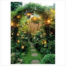 Gap Photos Garden Plant Picture Library Small Town Garden With Paving Slabs In Grass Beneath Arch With Lig Garden Entrance Whimsical Garden Garden Arches