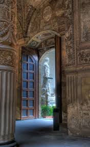 The secret passages tour of palazzo vecchio gives you access to hidden rooms, including the famed studiolo with its secret doors. Inside The Palazzo Vecchio In Florence Italy Looking Out At The Copy Of Michelangelo S David Florence Italie Toscane Italie Toscane