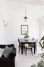 Black And White Dining Table Vintage Beach Home In Black And White Dining Table Black Timber Dining Table White Interior