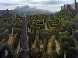 After Talking To The Wiseman Sarah And Hoggle Walk Through A Hedge Maze Jareth S Face Is On The Floor To The Left Of The Obelisk Labyrinth Movie Labyrinth Labyrinth Maze