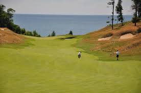 When pictures of the new layout—a mile inland from the resort's tremendously popular first course, which fronts lake michigan. The Best Hole In The Nation 11 Picture Of Arcadia Bluffs Golf Club Tripadvisor