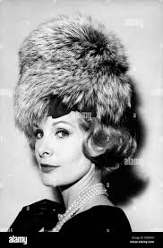 Model wearing black hat Black and White Stock Photos & Images