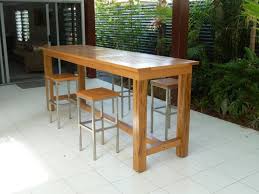 Long Narrow Rectangle Alfresco Dining Table Feat Four Metal Backless Outside Bar Stools With Square Wooden Seat Bar Table And Stools Bar Table Bar Furniture