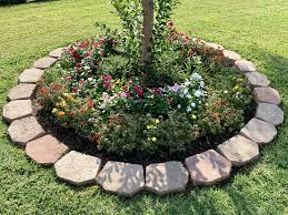 Cast a glance at the gallery below and surge inspiration. Vicky S Round Flower Bed Stone Flower Beds Porch Flowers Flower Beds
