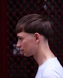 Bowl cut with a light side sweep and under shaved sides: Pin On Trends
