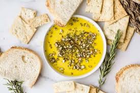 Extra Virgin Olive Oil Herb Dip Is A Garlicky Flavorful Accompaniment To Any Bread This Copycat O In 2020 Olive Oil Dip For Bread Cooking Recipes Bread Dipping Sauce