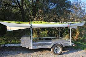 Canoekayak Trailer That I Had Built Storage Box On Front And Removable Tongue Lots Of Room For Storage On The Bed Canoe And Kayak Kayak Trailer Kayaking