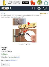 the amazon com ad image for this tiny spy camera that fits into a screw shows it being installed on the inside spy camera spy camera bathroom hidden spy camera