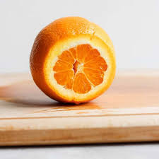 Slice into the peel diagonally from 1 side down to the middle of the fleshy side on the cutting board, then repeat this for the other side to cut the half into 3 even wedges. How To Cut An Orange Step By Step Tutorial Feelgoodfoodie