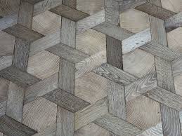 Trend Alert Geometric Flooring Chateau Edition Remodelista Woven Wood Geometric Floor Wood Floor Pattern