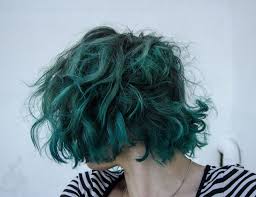 Short Tousled Green Turquoise Bob Hair Goes Well With Thin Black And White Stripes Turquoise Hair Green Hair Curly Hair Inspiration