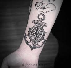 The 3d anchor tattoo design below looks spectacular. A Black Anchor Compass Tattoo Inked On The Right Wrist Compass Tattoo Design Anchor Compass Tattoo Compass Tattoo