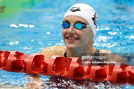 Brayden McCarthy of Australia competes in the Men's Butterfly 100m... News  Photo