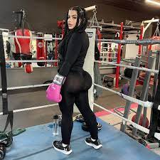 Model with 'biggest butt on OnlyFans' wows in tight gym wear as she hits  boxing ring 