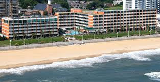 Oceanfront Virginia Beach Hotel Near Oceana Holiday Inn Suites Virginia Beach Hotels Beach Hotels Sandbridge Beach
