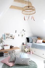 Boho Chic Little Girls Bedroom With Feathers Hanging From Wicker Light Fixture Kid Room Decor Girl Room Kids Room Design